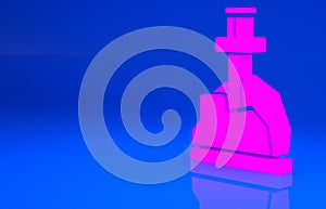 Pink Sword in the stone icon isolated on blue background. Excalibur the sword in the stone from the Arthurian legends