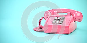 Pink telephone. Vintage retro push button telephone on cyan backgound
