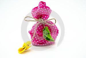 Pink textile sachet pouch with cords. isolated