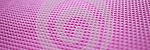 Pink texture of a sports mat and rubber pattern for background