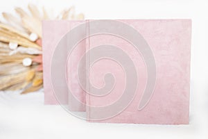 Pink textured photo albums