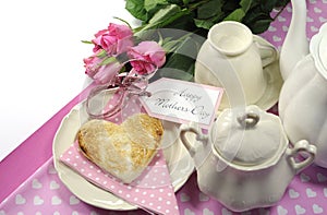 Pink theme Happy Mothers Day breakfast tray with copy space