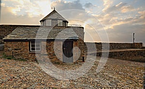 Harbour masters hut at Charlestown, Cornwall photo