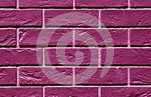 Pink toned brick wall pattern.