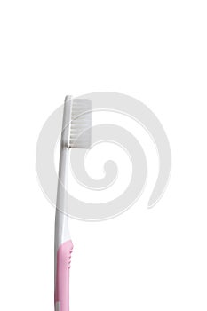 Pink toothbrush isolated on white background. Copy space with clipping path