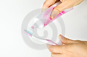 Pink toothpaste toothbrush
