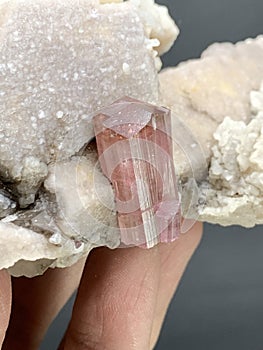 Pink tourmaine with microcline feldspar and qartz specimen from afghanistan