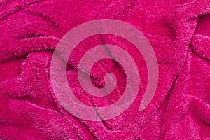 Pink towel fabric in a close up view