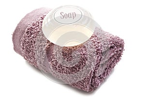 Pink towel with soap