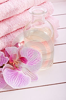 Pink towels with tropical orchid