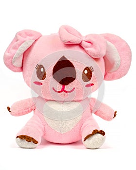 Pink toy koala. A teddy bear on a white background.