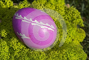 Pink traditionally decorated Easter egg