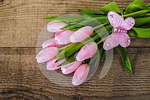 Pink tulips and butterfly