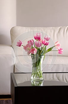 Pink tulips in modern living room