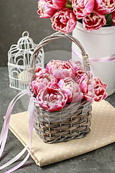 Pink tulips in wicker basket