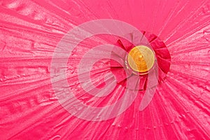 Pink umbrella handmade on white background