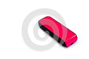 A pink USB flash drive with a plastic case, shot against a white background