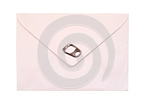 pink vintage paper envelope with metal ring pull for can opener isolated