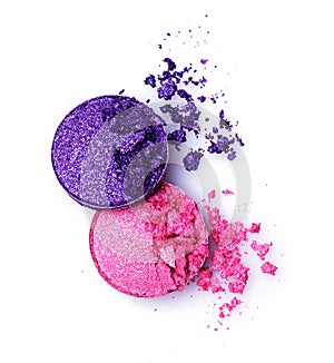 Pink and violet crushed shiny eyeshadows on white