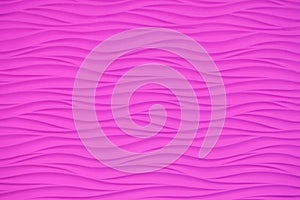 Pink wall with volumetric wavy patterns