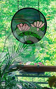 Pink water Lilies stained glass in window
