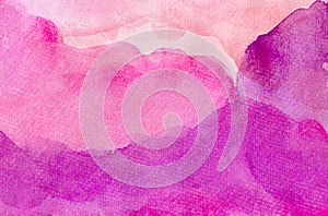 Pink watercolor background with purple layers of paint on watercolor paper texture, fun bright colorful abstract art