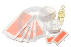 Pink waxing strips, cream and body oil