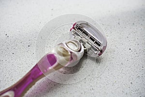 Pink well used dirty old rusty ladies razor shaver