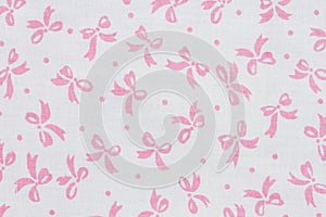Pink and white bow textured fabric background