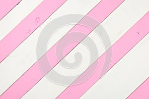 Pink and White Diagonal Slanted Striped Shiplap Boards with room or space for copy, text or design. A horizontal crop background b