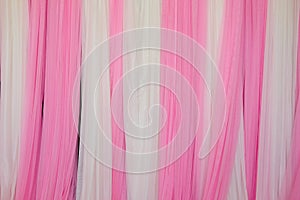 Pink and white fabric backdrop