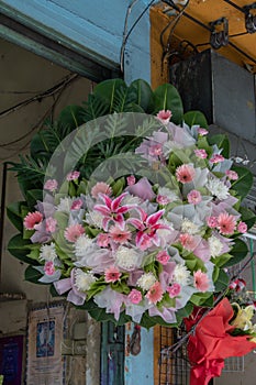 Pink and white flower arrangement wreath for funerals .Gerbera ,Lily,Carnation and Mum flower of funeral wreath.