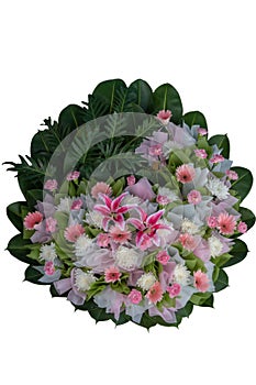 Pink and white flower arrangement wreath for funerals isolated on white background and clipping path.