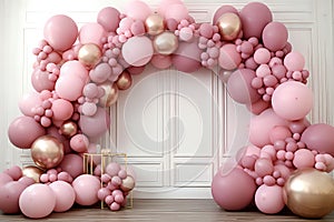 pink and white frame of ballons for decoration for birthday or other event. Pink background.