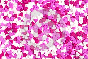 Pink and white hearts. Holiday background, top View.