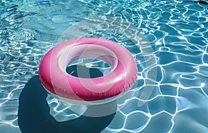 Pink and White Life Preserver Floating in Pool