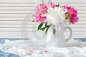 Pink and white peonies still life