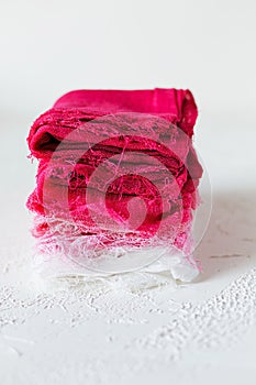 Pink and white textile on white background