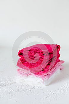 Pink and white textile on white background