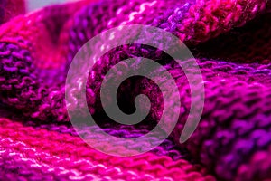 Pink, white and violet striped knitted texture background