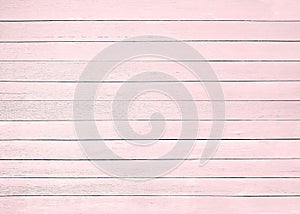 Pink white wood floor texture background. plank pattern surface pastel painted wall; gray board grain tabletop above oak timber;