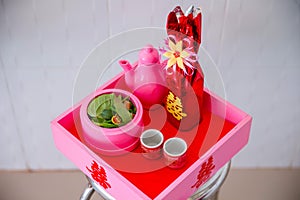 Pink wine tray for wedding Vietnam: wine jar and 2 small wine bottles, betel nut boxes