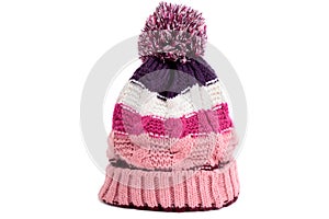 Pink winter bobble ski hat white background