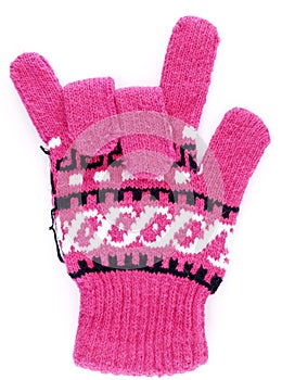 Pink winter glove hand gesturing love sign isolated on white background