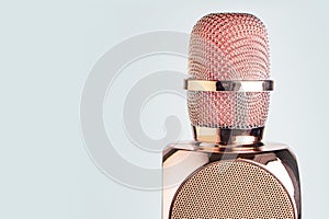 Pink wireless microphone isolated on white background