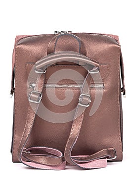 Pink woman's leather fashion backpack on white background