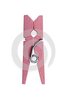 Pink wooden clip isolated on white background. Close up of a clothes peg on white background