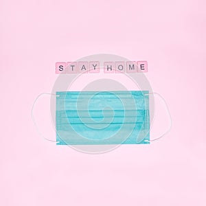 Pink wooden letters `stay home`