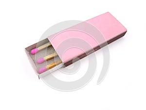 Pink wooden matches in matchbox