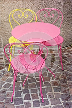 Pink and yellow chairs